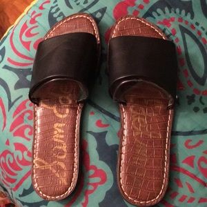 Black leather slides